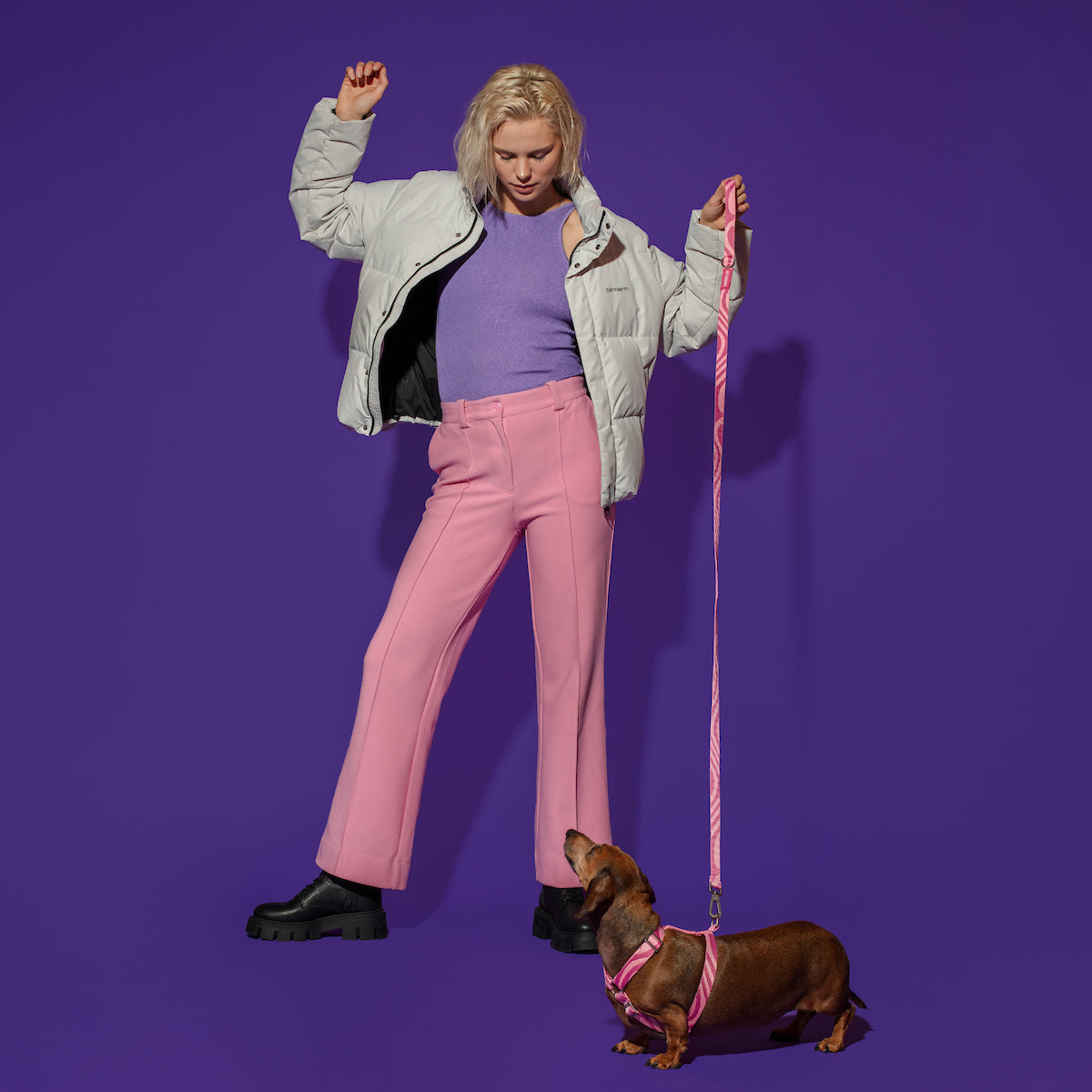 Hot Doggies Classic Leash in Pink Wavy Design in use, highlighting its smooth handle and elegant wave pattern during a stylish dog walk.