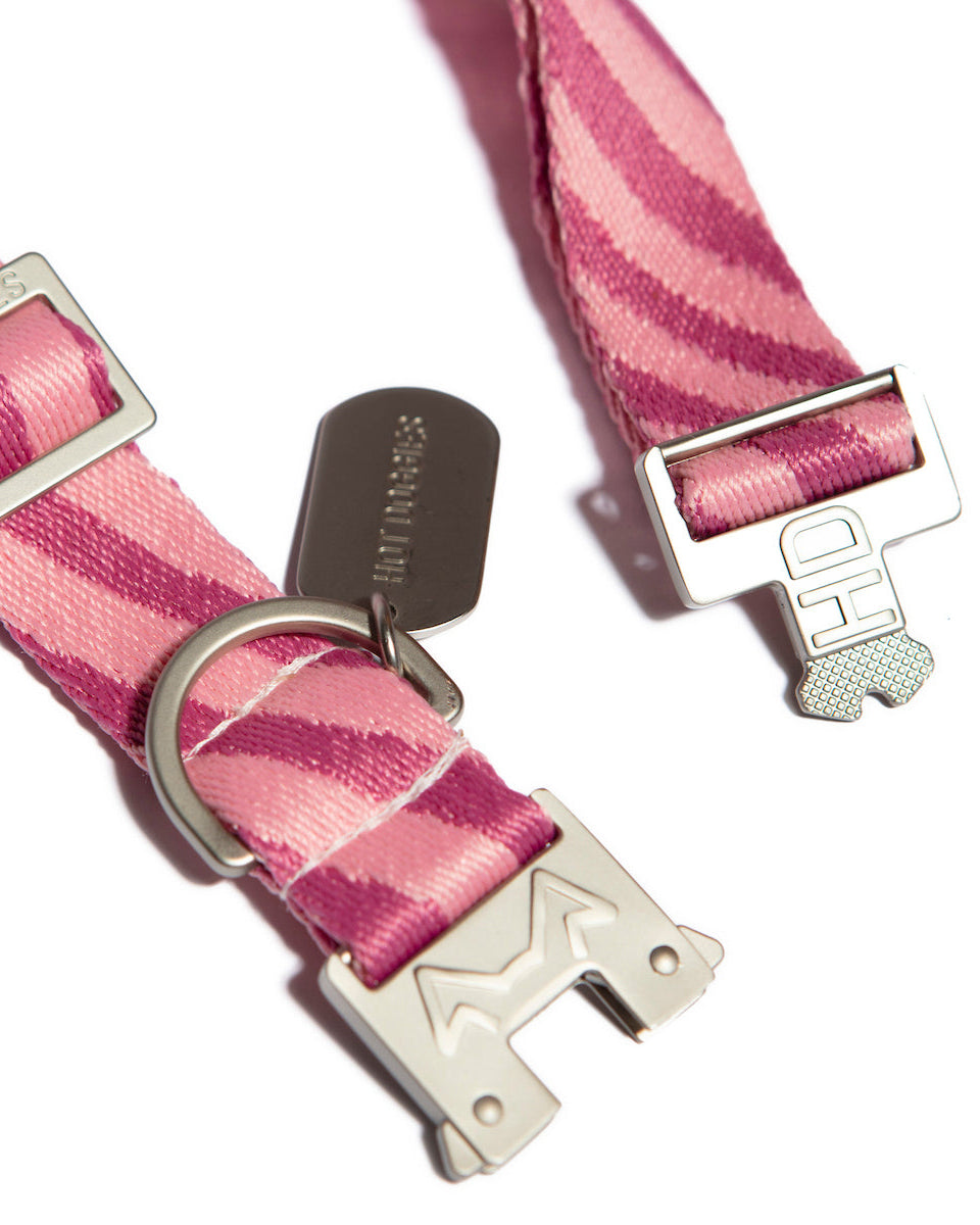 Detailed view of metal hardware on Hot Doggies pink wave patterned recycled polyester collar, combining strength and style.