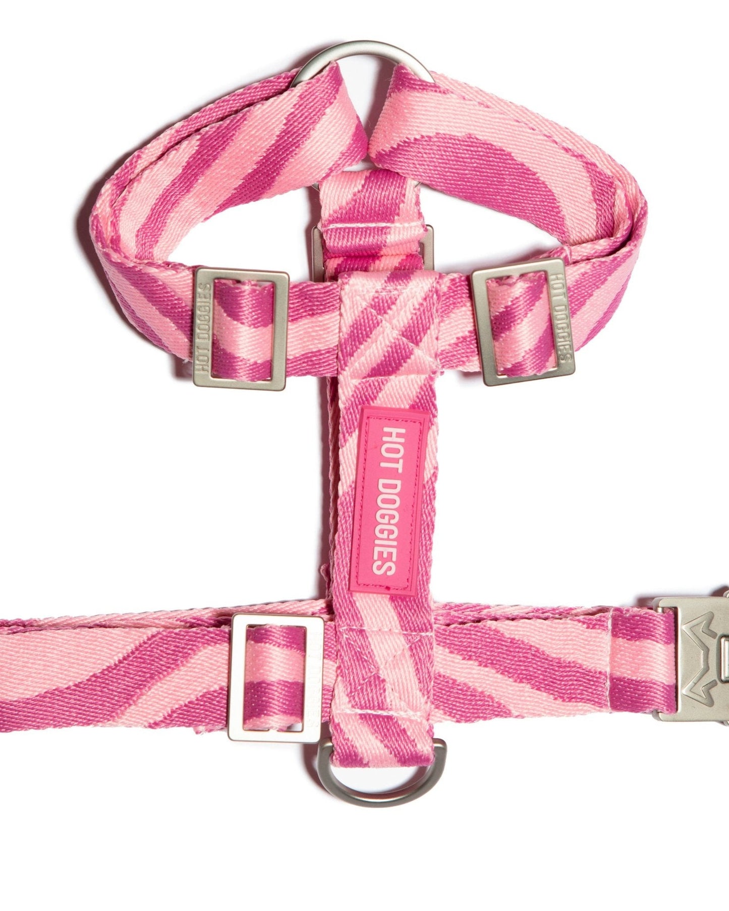 Flat lay of the Roxy Pink Harness with pink wave pattern, showcasing the sleek design and adjustable straps.