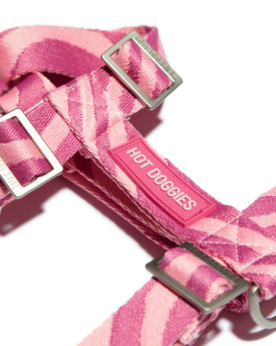 side of the Roxy Pink Harness with pink wave pattern, showcasing the sleek design and adjustable straps.