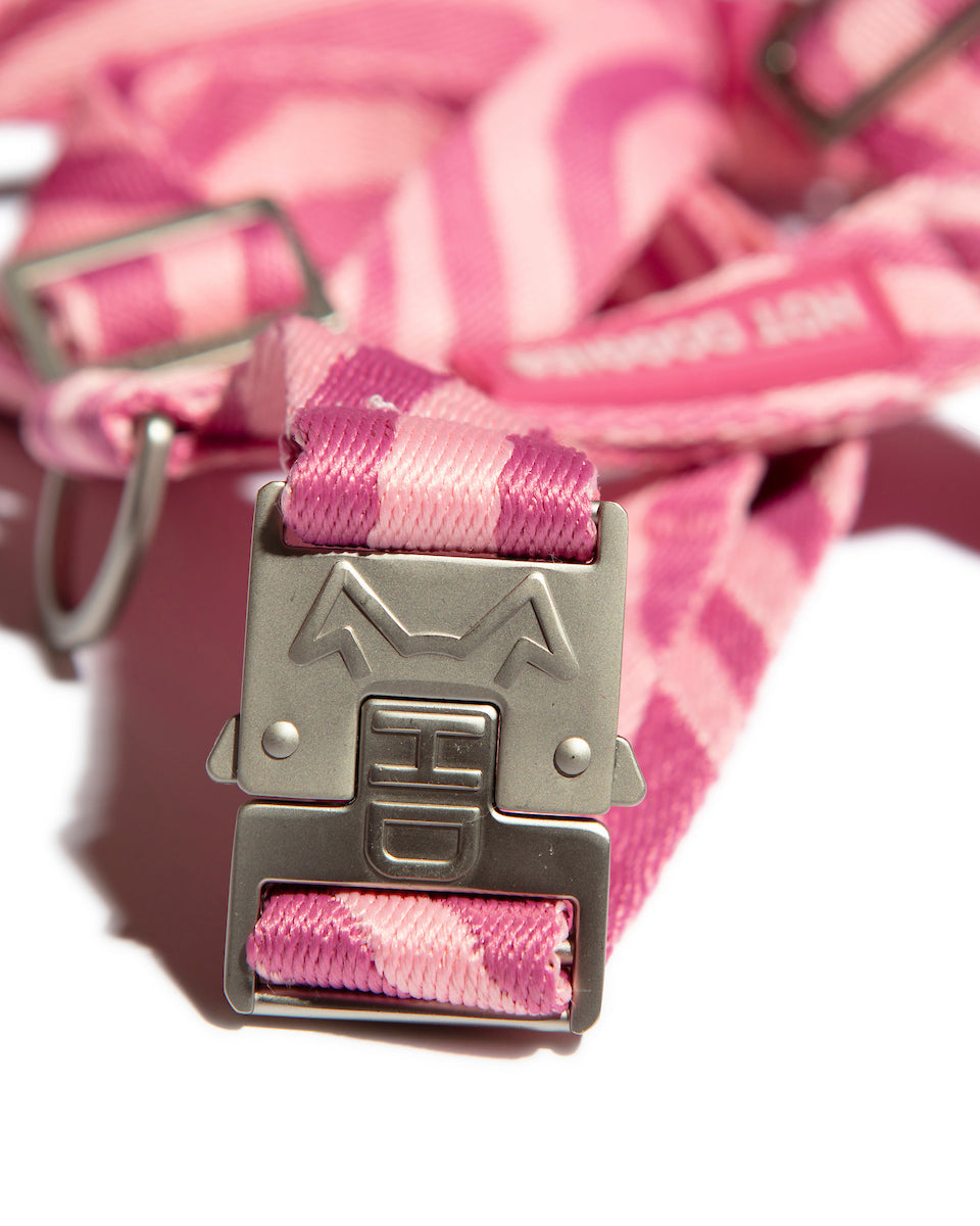 metal hardware of the Roxy Pink Harness with pink wave pattern, showcasing the sleek design and adjustable straps.