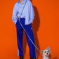 Eco-conscious Hot Doggies Hands-Free Leash Blue/Lime, worn by model, adjustable length 150–240cm, made with sustainable recycled polyeste