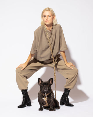 Hot Doggies Hands Free Leash Coco Noir – eco-friendly beige and black dog leash modeled with French Bulldog and fashion model, stylish hands-free dog walking gear.