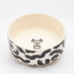 Top view of Hot Doggies Monochrome Ceramic Bowl with abstract black-white pattern, dog-friendly design.