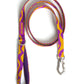 Dog leash with purple and yellow pattern on a white background.