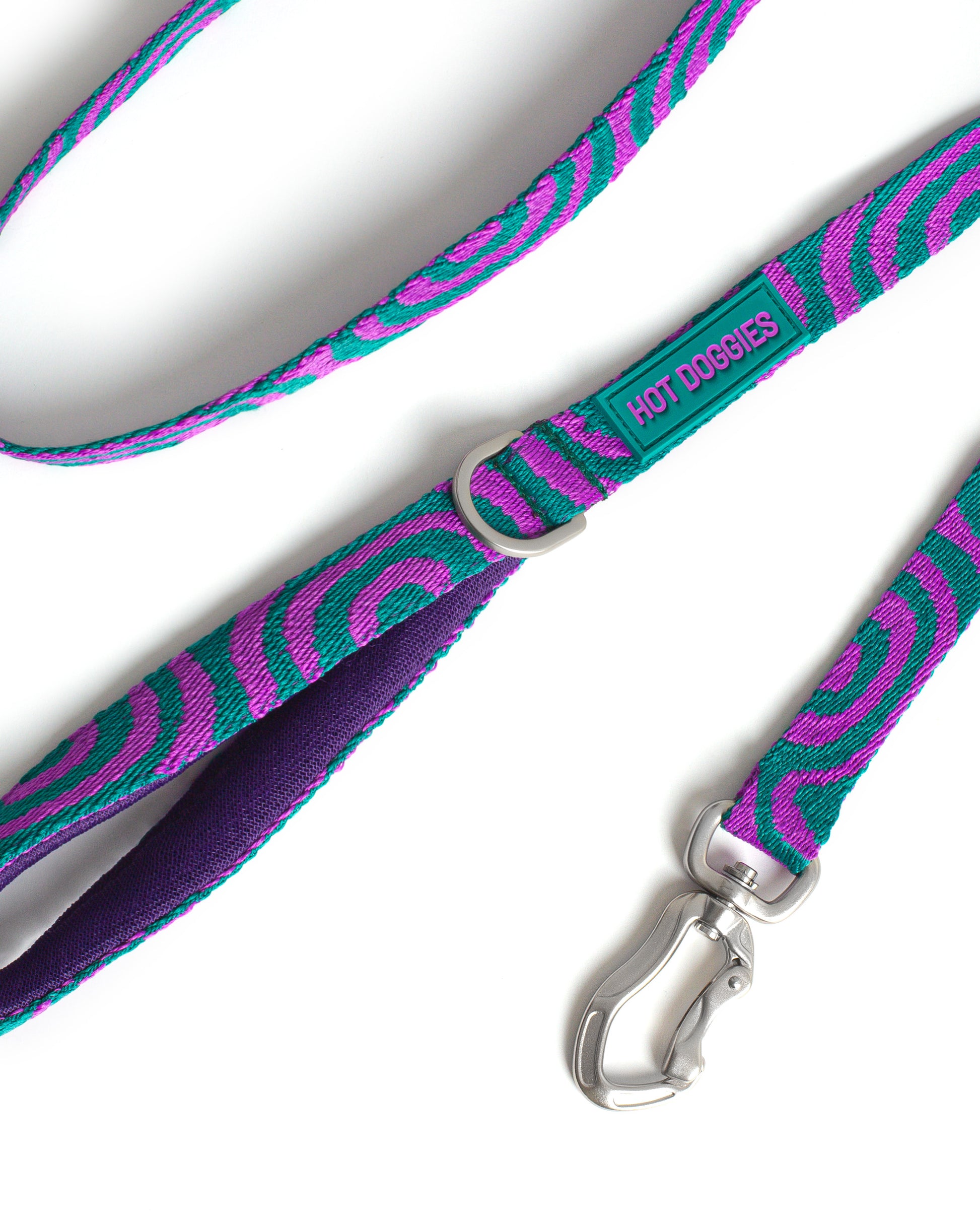 Dog LOLA GROOVE HANDS-FREE LEASH with purple and green pattern on a white background.