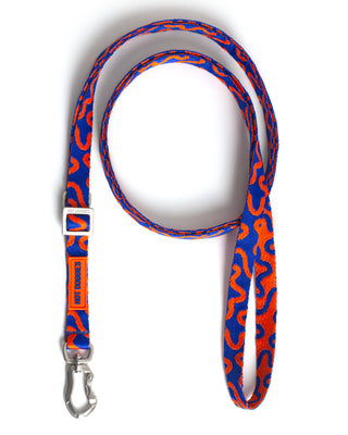 Blue and orange patterned dog HANDS-FREE LEASH ROCKY ELECTRIC with a metal clip on a white background