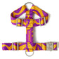 Dog harness with purple and yellow pattern on a white background