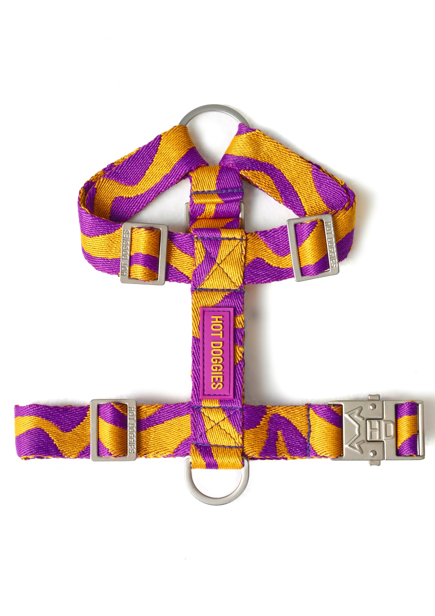 Dog harness with purple and yellow pattern on a white background