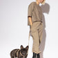 Hot Doggies Classic Leash in Beige/Black in use during a stylish dog walk, highlighting its chic design and ergonomic handle.