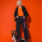 Dog owner walking with Hot Doggies Classic leash in purple and orange, stylish and eco-friendly 150cm leash with padded handle, perfect for everyday walks