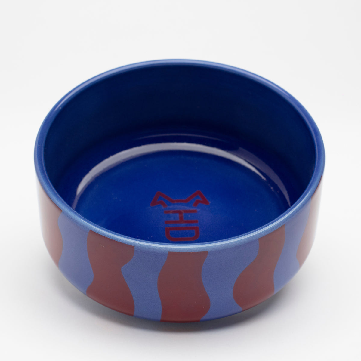 Hot Doggies Fusion Ceramic Bowl - side view with vibrant blue and red striped design - durable and dishwasher-safe for small and medium dogs