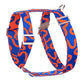 Dog harness with blue and orange pattern on a white background