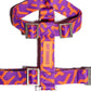 Flat-lay of the Hot Doggies Coco Noir Harness featuring a sleek, modern purple and orange design.

