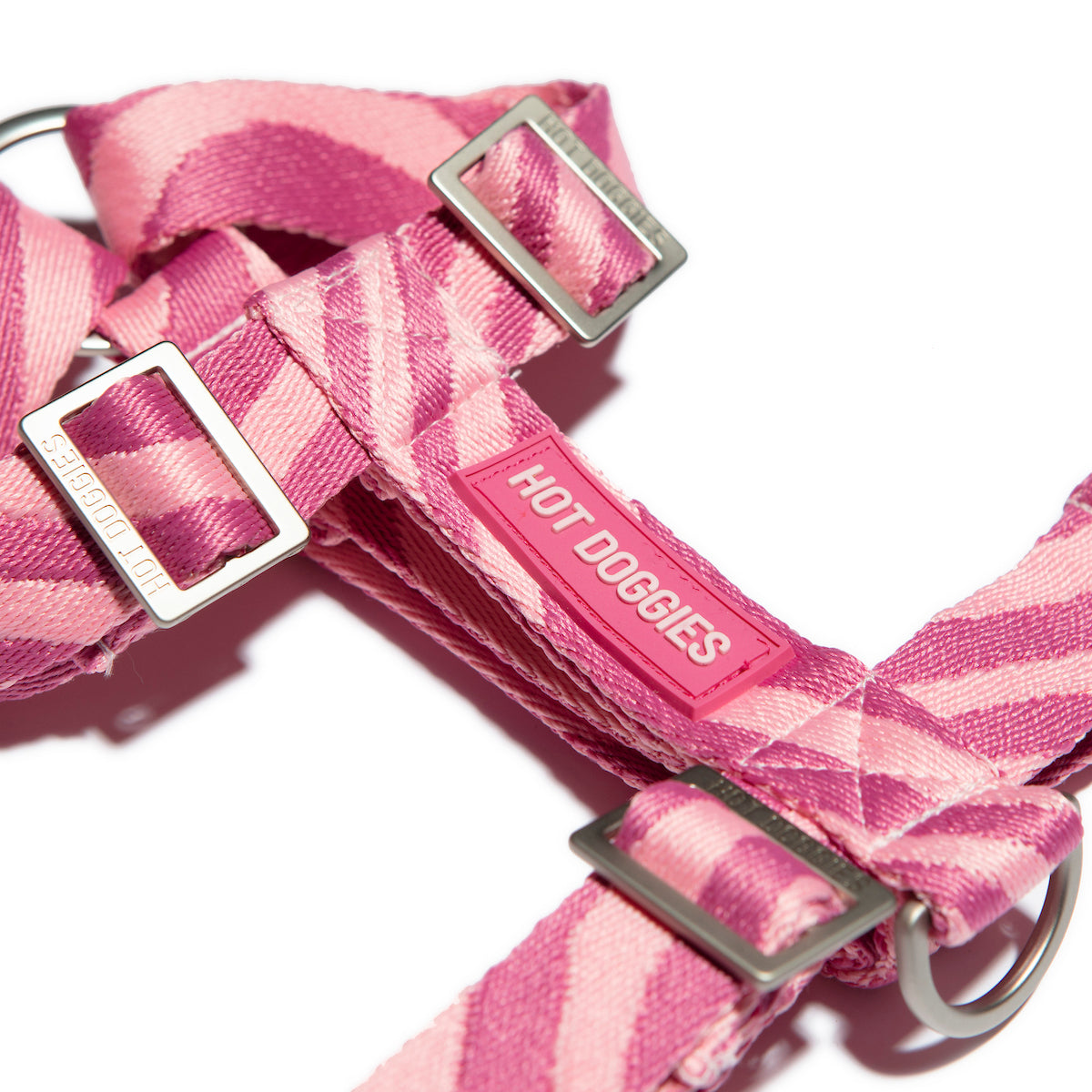 side of the Roxy Pink Harness with pink wave pattern, showcasing the sleek design and adjustable straps